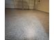Spacious epoxy garage floor, offering a clean and durable surface perfect for any car enthusiast at 1030 Country Skies Ave, Las Vegas, NV 89123