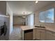 View of the modern kitchen with white cabinets and stainless steel appliances at 1030 Country Skies Ave, Las Vegas, NV 89123