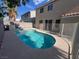 Backyard pool with secure fence, promising endless summer fun and relaxation at 1030 Country Skies Ave, Las Vegas, NV 89123