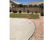 Backyard featuring a concrete patio and grass area at 10342 Spider Rock Ave, Las Vegas, NV 89135