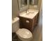 Bathroom featuring toilet, sink and vanity with white countertop at 10342 Spider Rock Ave, Las Vegas, NV 89135