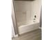 Well maintained bathroom with white tub and tile surround at 10342 Spider Rock Ave, Las Vegas, NV 89135