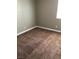 Bedroom featuring plush brown carpet and neutral color paint at 10342 Spider Rock Ave, Las Vegas, NV 89135
