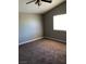The bedroom has a ceiling fan and a window at 10342 Spider Rock Ave, Las Vegas, NV 89135