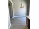 Empty dining room with a chandelier and modern flooring at 10342 Spider Rock Ave, Las Vegas, NV 89135