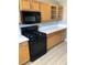 Light wood cabinets with modern stainless steel gas range and microwave at 10342 Spider Rock Ave, Las Vegas, NV 89135