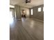 Light-filled living room features neutral colors and durable flooring at 10342 Spider Rock Ave, Las Vegas, NV 89135