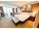 Spacious bedroom featuring a king-size bed, a seating area, and expansive windows offering stunning views at 125 E Harmon Ave # 2718, Las Vegas, NV 89109