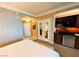 This bedroom features a kitchenette with sink, microwave, and cabinets, perfect for added convenience at 125 E Harmon Ave # 2718, Las Vegas, NV 89109