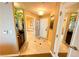 The tiled hallway leads to the bathroom and entry of the condo at 125 E Harmon Ave # 2718, Las Vegas, NV 89109
