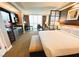 Charming kitchenette featuring modern appliances, seamlessly integrated into a stylish living space with amazing views at 125 E Harmon Ave # 2718, Las Vegas, NV 89109