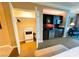 Convenient kitchenette featuring modern appliances and sleek dark cabinets at 125 E Harmon Ave # 2718, Las Vegas, NV 89109