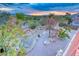 Landscaped backyard featuring stone accents, desert foliage and a rock bed running the length of the yard at 1367 Minuet St, Henderson, NV 89052