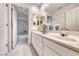 Bathroom featuring double sinks, tile flooring, and a shower and tub combo at 1367 Minuet St, Henderson, NV 89052
