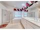Bright bathroom featuring a soaking tub, double vanity, and walk-in shower at 1367 Minuet St, Henderson, NV 89052