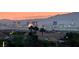 Distant city skyline view showcasing the vibrant cityscape at sunset at 1367 Minuet St, Henderson, NV 89052