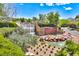 The Anthem by Del Webb entrance with a beautiful waterfall feature and landscaped surroundings at 1367 Minuet St, Henderson, NV 89052