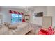 View of the main bedroom featuring a balcony, TV, and ensuite bath at 1367 Minuet St, Henderson, NV 89052