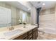Bathroom featuring a large vanity, a tub, and a shower, all next to the toilet at 1433 Overseer Ave, Henderson, NV 89074