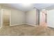 Neutral bedroom featuring plush carpeting, fresh walls, and an adjacent walk-in closet for ample storage at 1433 Overseer Ave, Henderson, NV 89074