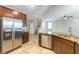 Spacious kitchen with stainless steel appliances and granite countertops at 1433 Overseer Ave, Henderson, NV 89074