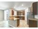 Modern kitchen with granite countertops, stainless steel appliances, and ample cabinet space at 1433 Overseer Ave, Henderson, NV 89074