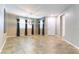 Spacious living room with tile flooring, neutral walls, and large windows for abundant natural light at 1433 Overseer Ave, Henderson, NV 89074
