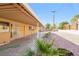 View of the backyard covered patio area with minimalist landscaping at 1509 Lucilee St, Las Vegas, NV 89101