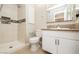 Updated bathroom with tiled shower, modern vanity, and neutral color palette at 1509 Lucilee St, Las Vegas, NV 89101