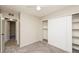 Inviting bedroom featuring neutral carpeting and a closet with sliding doors for ample storage at 1509 Lucilee St, Las Vegas, NV 89101