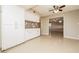 Well-lit kitchen featuring white cabinets and tile backsplash at 1509 Lucilee St, Las Vegas, NV 89101