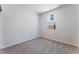 Bedroom displaying carpeted flooring, a window for natural light, and neutral walls at 1799 Passerine St, Las Vegas, NV 89138
