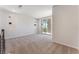 Spacious bonus room with large windows and sliding glass door for plenty of natural light and outdoor access at 1799 Passerine St, Las Vegas, NV 89138