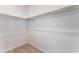 Walk-in closet showcasing carpeted flooring and white walls with shelving at 1799 Passerine St, Las Vegas, NV 89138