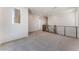 Comfortable loft area with a window and stylish railing, perfect for a seating area or playroom at 1799 Passerine St, Las Vegas, NV 89138