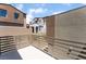 Private patio area with a modern fence, ideal for entertaining or relaxing outdoors at 1799 Passerine St, Las Vegas, NV 89138