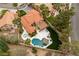 An aerial perspective highlights a beautiful home with a pool, hot tub, and lush backyard retreat at 1990 Freeman Ct, Henderson, NV 89014