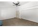 Spacious bedroom featuring a ceiling fan and carpet at 1990 Freeman Ct, Henderson, NV 89014