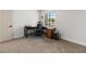 Cozy bedroom with natural light, a ceiling fan, and desk area at 1990 Freeman Ct, Henderson, NV 89014
