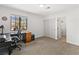 Cozy bedroom with natural light, a ceiling fan, and desk area at 1990 Freeman Ct, Henderson, NV 89014