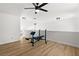 Bright bonus room featuring a ceiling fan and space for a home gym at 1990 Freeman Ct, Henderson, NV 89014
