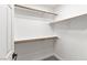 Well-organized walk-in closet with built-in shelving and ample storage space for clothing and accessories at 1990 Freeman Ct, Henderson, NV 89014
