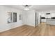 Light-filled dining area with wood floors and modern chandelier at 1990 Freeman Ct, Henderson, NV 89014