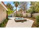 Backyard hot tub surrounded by low-maintenance desert landscaping on a sunny day at 1990 Freeman Ct, Henderson, NV 89014