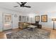Inviting living room with lots of windows, stylish furnishings and decor at 1990 Freeman Ct, Henderson, NV 89014