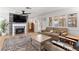 Comfortable living room with a fireplace and access to the outdoors at 1990 Freeman Ct, Henderson, NV 89014