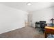 Bright office features a desk with carpeted floors and neutral paint at 1990 Freeman Ct, Henderson, NV 89014