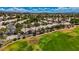 An aerial view shows lush green fairways bordering well-maintained homes in this golf course community at 2149 Eaglepath Cir, Henderson, NV 89074