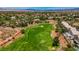 An overhead shot showcases a lush green golf course surrounded by luxury homes and manicured landscaping at 2149 Eaglepath Cir, Henderson, NV 89074