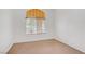 Bedroom with carpeted floor and a window with blinds at 2149 Eaglepath Cir, Henderson, NV 89074